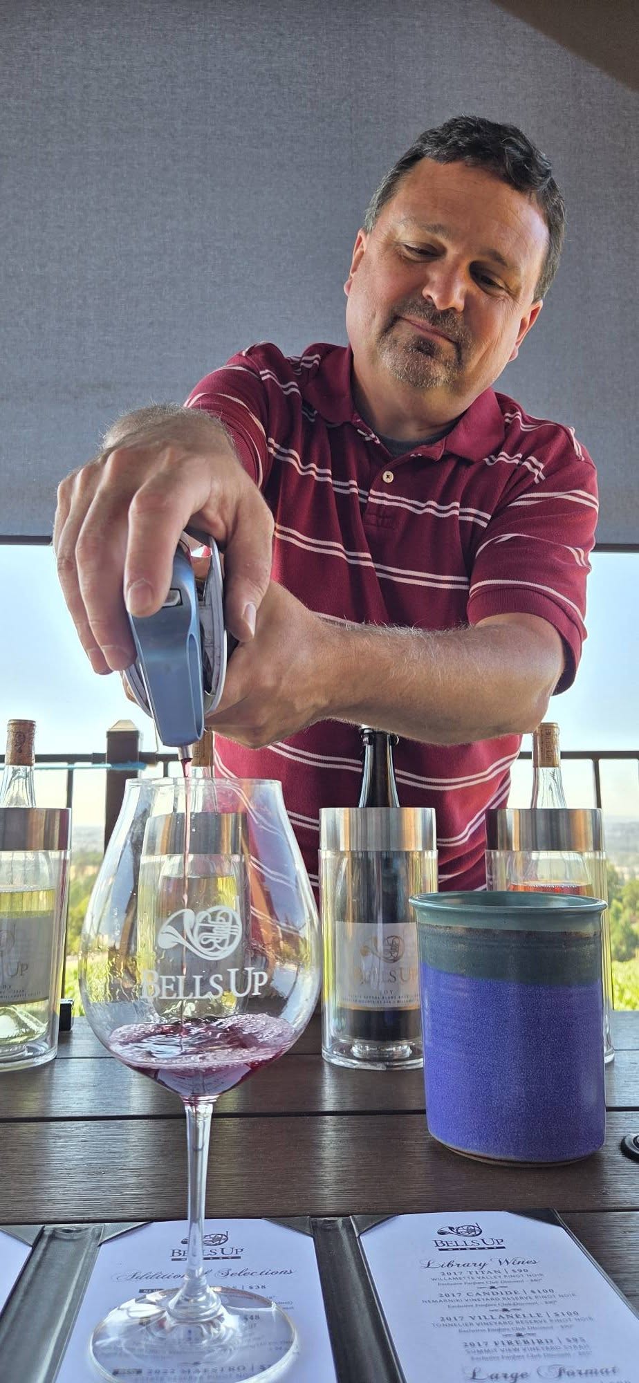 Dave pouring Pinot Noir into a Bells Up glass